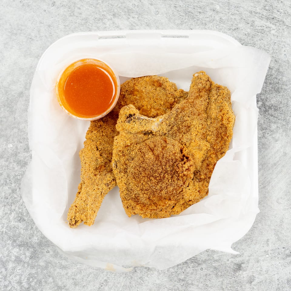 Golden fried fish fillets with dipping sauce