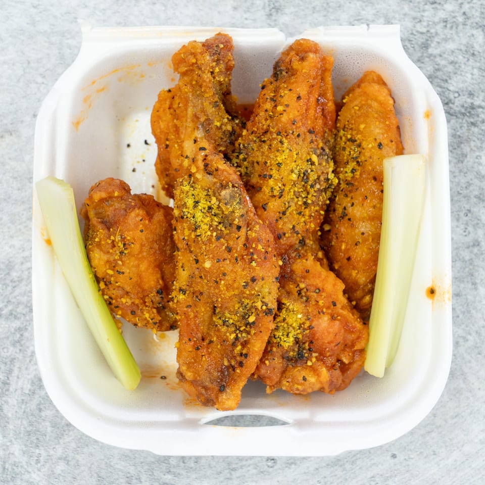Garlic pepper wings with celery