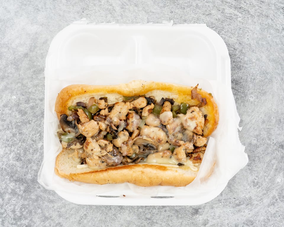 Loaded Philly cheesesteak with fries